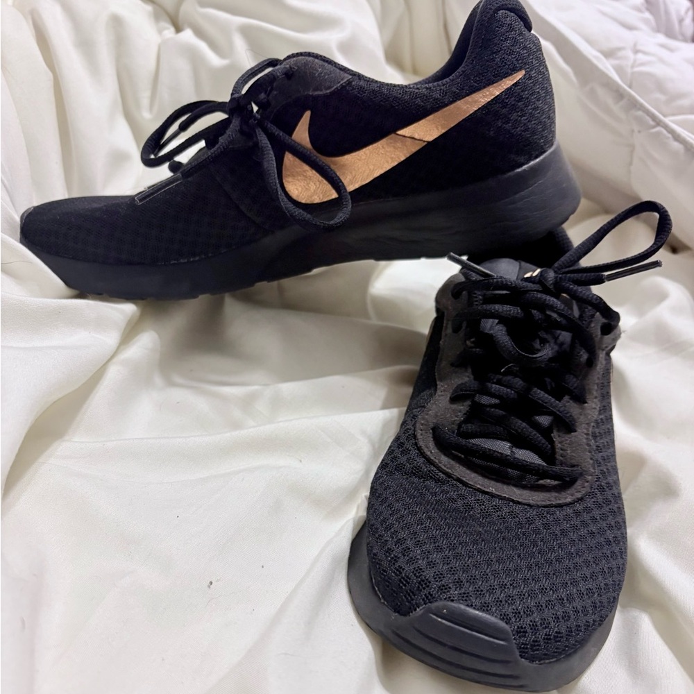 Nike Black and Rose Gold Sneakers Sleek Design